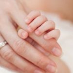 Baby-hand-and-moma-finger_d200