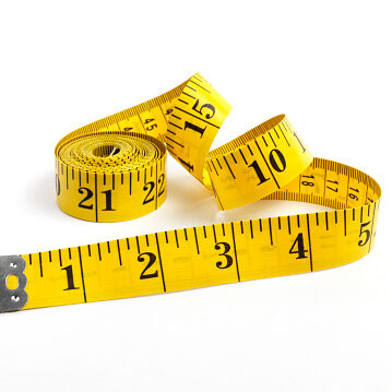 yellow tape measure isolated on white